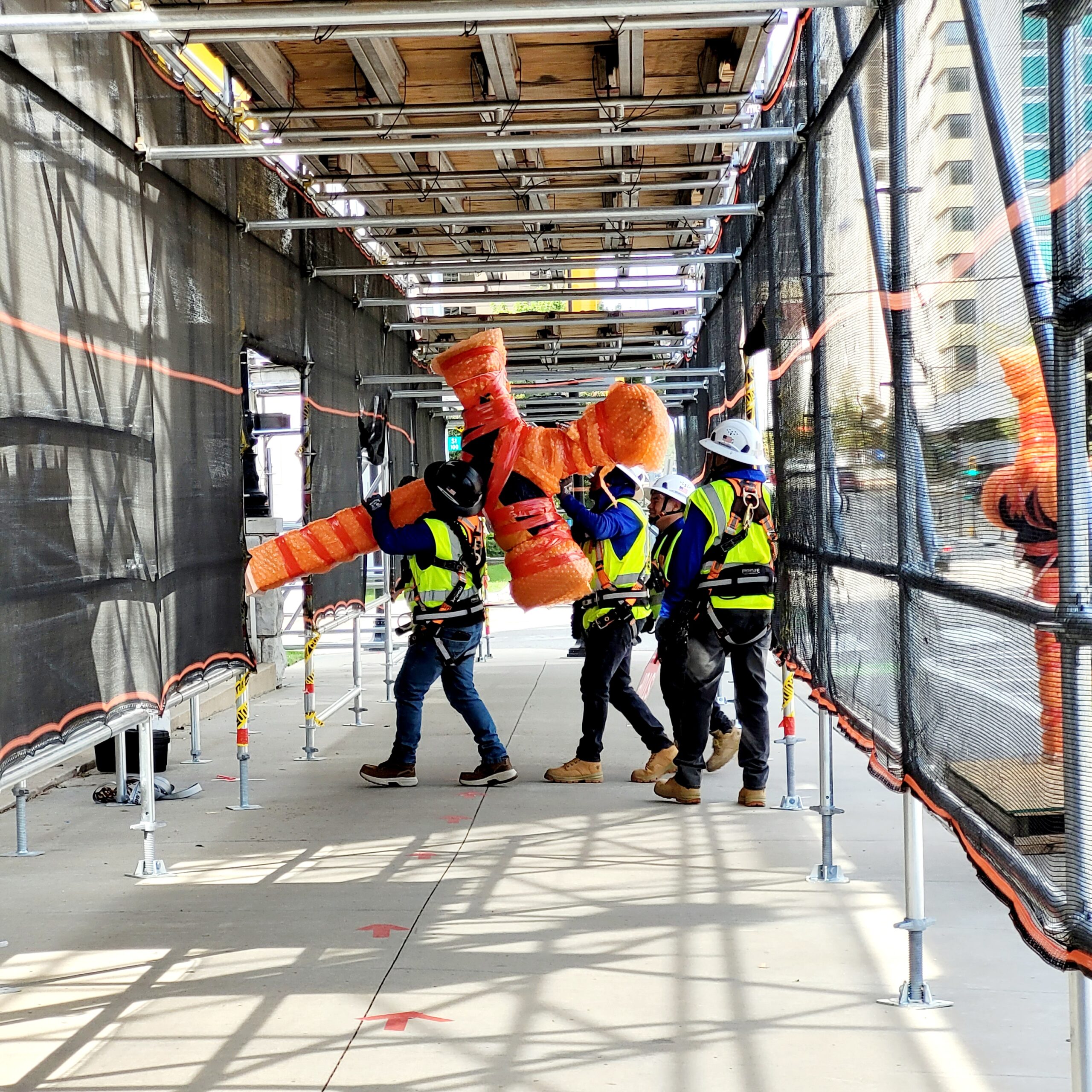 Cross Raising: Watch as the cross is lifted into place
